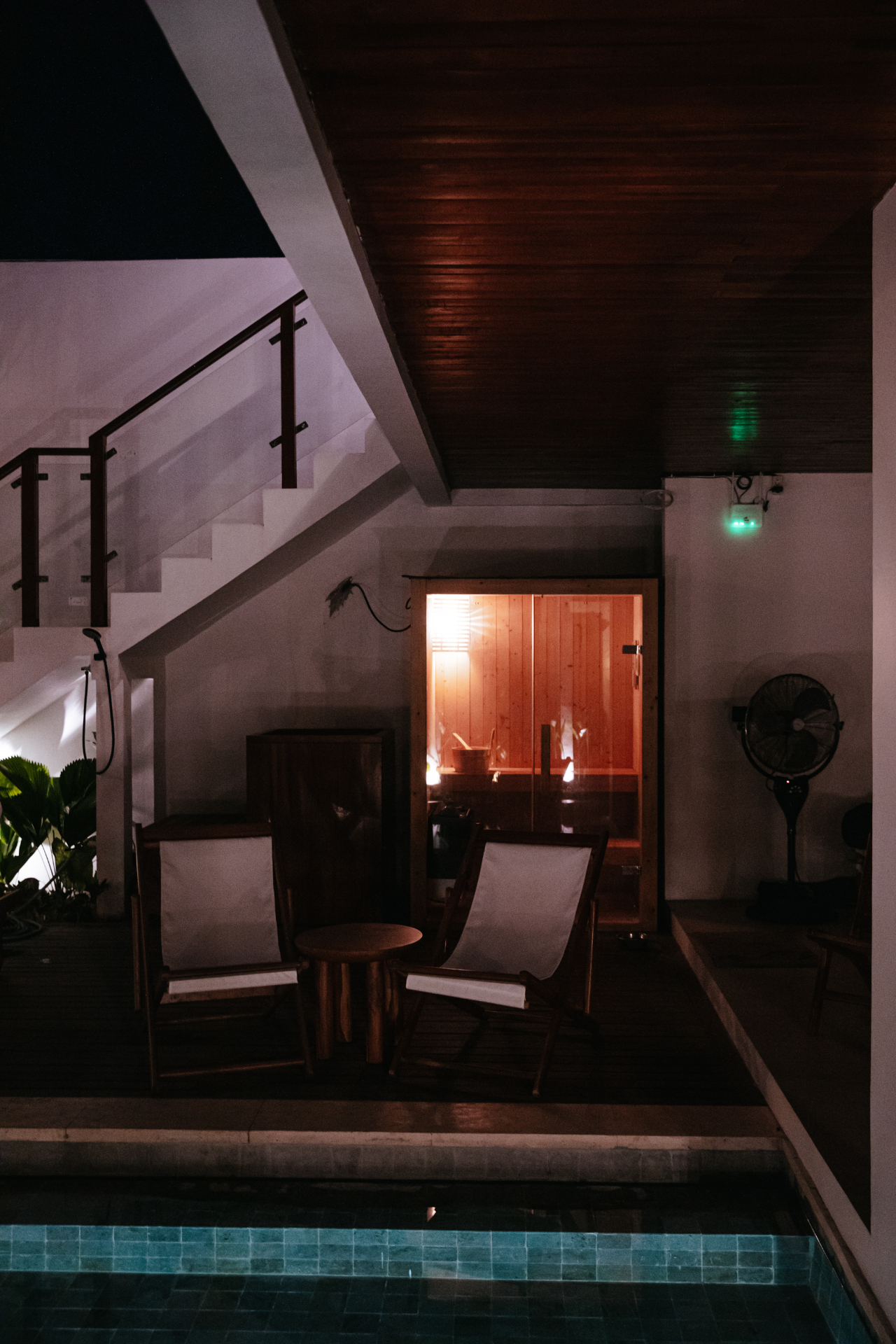 Sauna glow beside the pool
